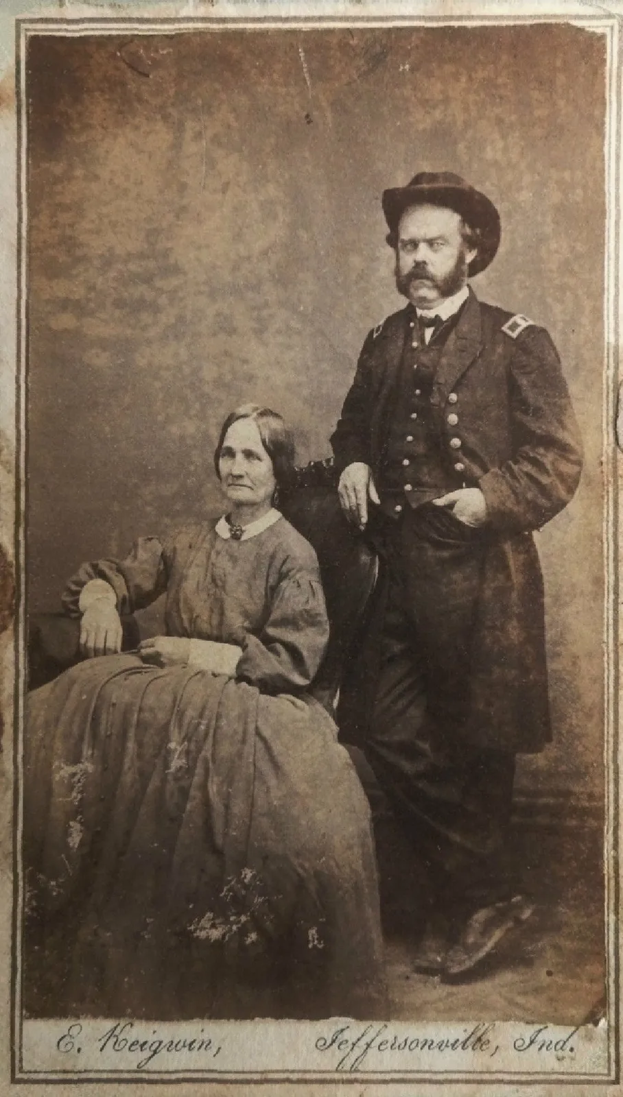 Original: A Civil War officer standing beside his seated wife, carte de visite